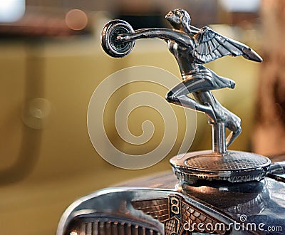 Rolls Royce hood ornament on 1985 model displayed at Malaga Automobile Museum. Editorial Stock Photo