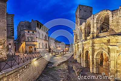 Roman amphitheatre at dusk in Arles, France Stock Photo