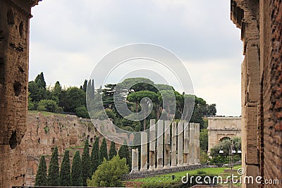 The roman bath ruins and titus arch Stock Photo