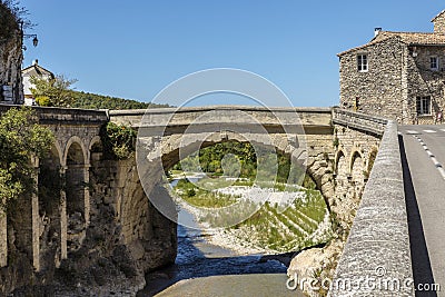 Roman bridge and old town in vaison la romaine Stock Photo