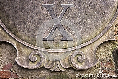 Roman number written on stucco wall - concept image Stock Photo