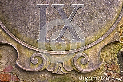 Roman number written on stucco wall - concept image Stock Photo