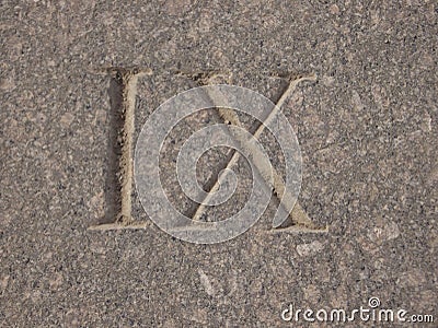Roman numeral - nine carved in stone Stock Photo