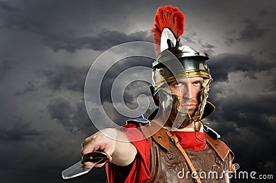 Roman Soldier Brandishing Sword Stock Photo