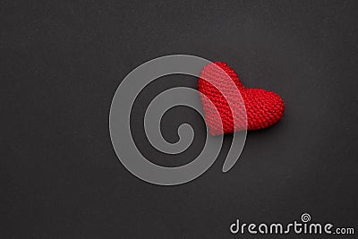 romance and love concept. red heart symbol over black moody background. view from above Stock Photo