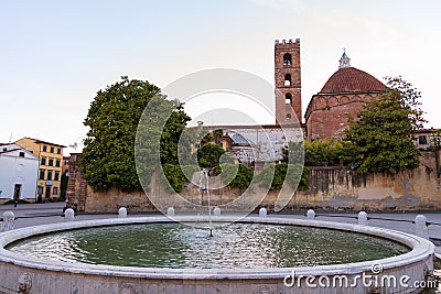 Romanesque Facade and bell tower of St. Martin Cathedral in Lucca, Tuscany, Italy Editorial Stock Photo