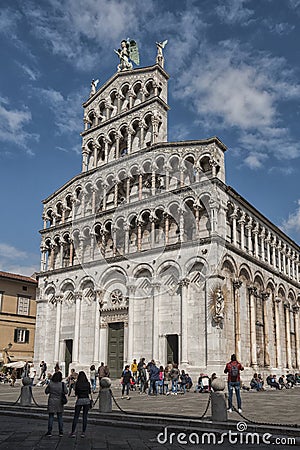 Romanesque facade of the San Michele in Foro, a Roman Catholic church in Lucca, Tuscany Editorial Stock Photo