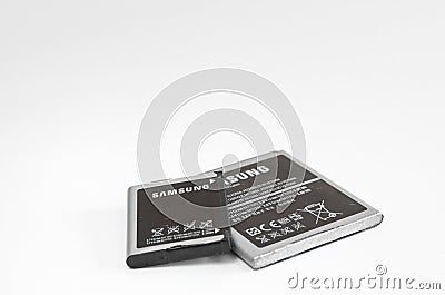 Romania -April 18,2020 : Close-up of used old storage battery for samsung phone ready to be taken to a reconditioning center Editorial Stock Photo