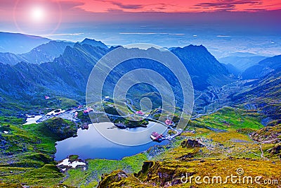 Romania mountain at sunset. Fagaras Balea lake and Transfagarasan Stock Photo