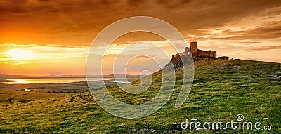 Romania sunset in Dobrogea at the Enisala Fortress. Important historical landmark near Tulcea and Constanta Stock Photo