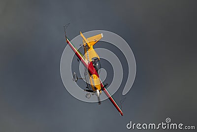 Aeroclub of Romania performing aerial acrobatics at BIAS 2023, Extra 330SC plane. Editorial Stock Photo