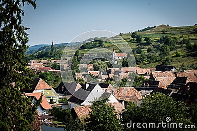 Romanian Biertan village and hills landscape. Editorial Stock Photo