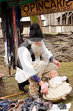 Romanian old man wearing in traditional costume Editorial Stock Photo