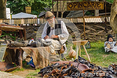 Romanian old man wearing in traditional costume Editorial Stock Photo