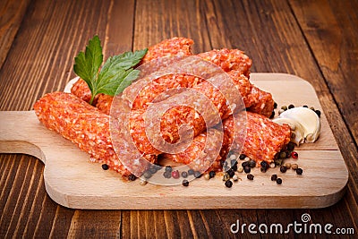 Romanian pork and lamb sausages, mititei with pepper and garlic Stock Photo