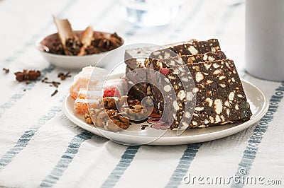 Romanian salami Cake with cocoa, turkish delight and walnuts Stock Photo