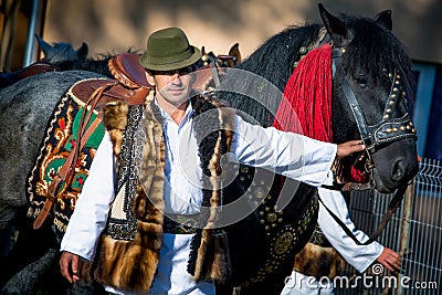 Romanian traditional costume in Bucovina county on celebration time Editorial Stock Photo