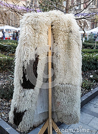 Romanian traditional sheep skin coat at a peasants fair in Bucharest, Romania Stock Photo