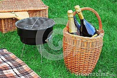 Romanic Weekend Picnic With BBQ Grill And Champagne Concept Stock Photo