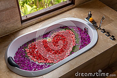 Romantic Bath with Flowers Stock Photo