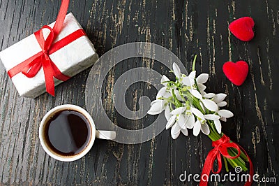 Romantic coffee with flowers and a present Stock Photo