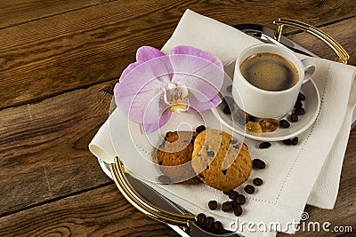 Romantic coffee served with orchid on the serving tray Stock Photo