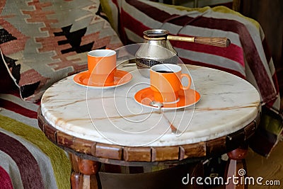 Romantic coffee table, two cups of coffee on a marble table. Stock Photo