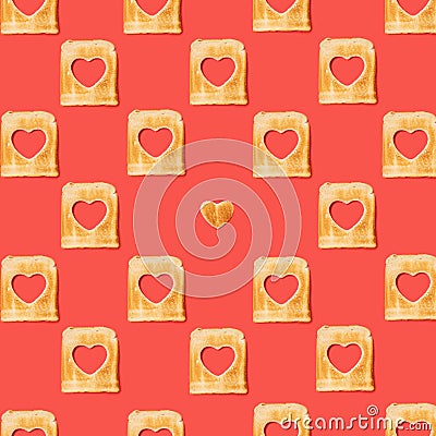 Romantic concept. Pattern made of many slices of toasted bread with a one heart shaped toast . Flat lay arrangement with lovely Stock Photo