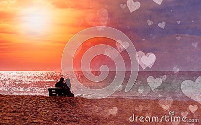 Romantic couple on the beach at colorful sunset on harts background. Perfect tropical sunset landscape, exotic nature view. Happy Stock Photo