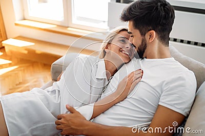Romantic couple in bed Stock Photo