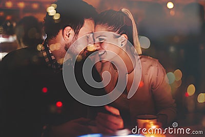 Romantic couple dating in pub Stock Photo