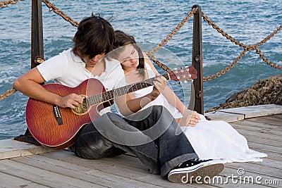 romantic couple with guitar Stock Photo