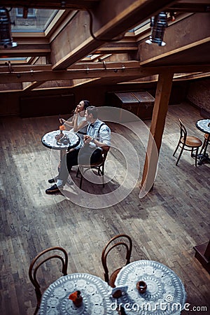 Romantic couple in love bonding in cafe Stock Photo