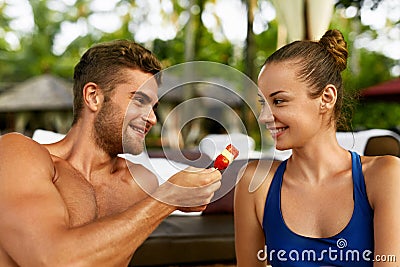 Romantic Couple In Love Having Fun Together Feeding Each Other Stock Photo