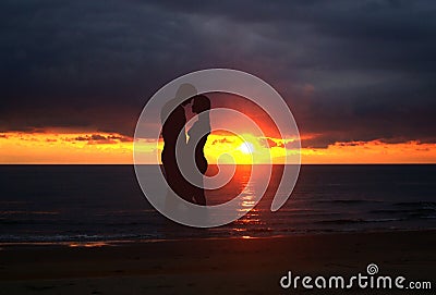 Romantic couple at sunset Stock Photo