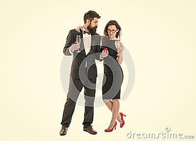 Romantic couple. tuxedo man present jewel ring in box to woman. couple drink champagne for union conclusion. happy Stock Photo