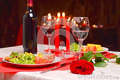 Romantic dinner with candles Stock Photo