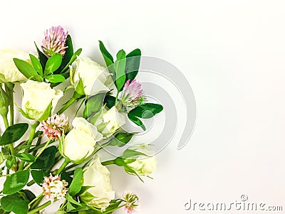 Romantic elegant bouquet made of roses and clover flowers. Flay lay, top view Stock Photo