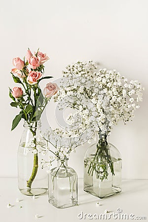 Romantic elegant wedding flowers arrangement on table wall background Stock Photo