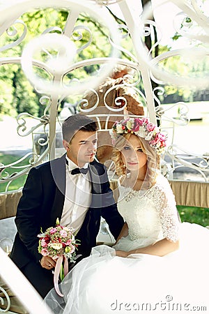 Romantic fairy-tale wedding couple bride and groom hugging in ma Stock Photo