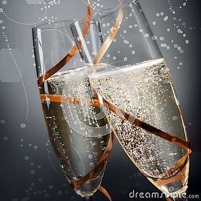 Romantic flutes of sparkling golden champagne Stock Photo