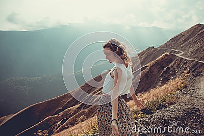 Romantic free young woman with hair wind enjoy harmony with nature and fresh air. Peace of mind. Happy tranquil girl, inspiration Stock Photo