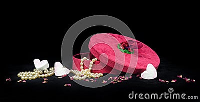 Romantic gift of hearts and pearls for someone special. Stock Photo