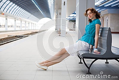 Romantic girl on railway station Stock Photo