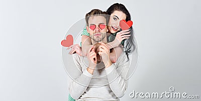 Romantic ideas celebrate valentines day. Man and woman couple in love hold red heart valentines cards white background Stock Photo