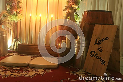 romantic indoor decoration with fresh flowers for weddings, fiancÃ©s, ceremonies. Stock Photo