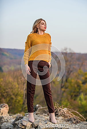 Romantic journey. sexy woman red lipstick nature background. warm and cosy seasonal clothes. girl long hair. autumn Stock Photo