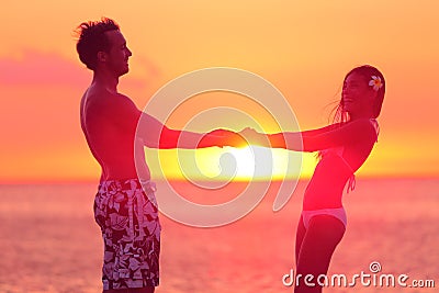 https://thumbs.dreamstime.com/x/romantic-lovers-couple-dancing-bikini-beach-swimwear-having-fun-sunset-travel-happy-women-men-holding-hands-50582299.jpg