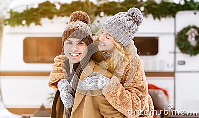 Romantic millennial couple having fun together at winter camping Stock Photo