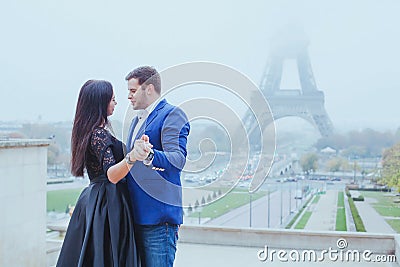 Romantic moment near Eiffel tower Stock Photo